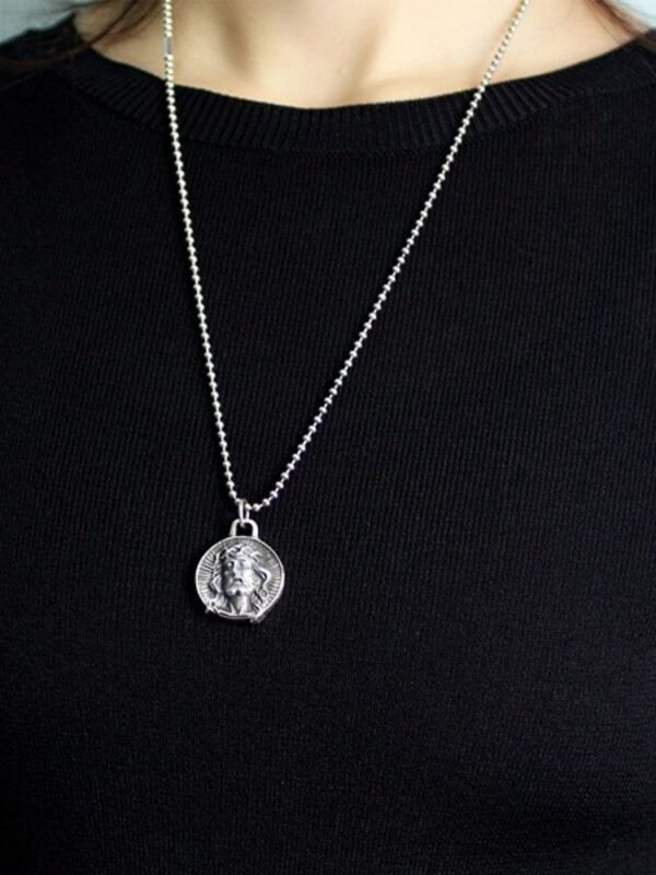 925 Sterling Silver Jesus Coin Pendant on neck