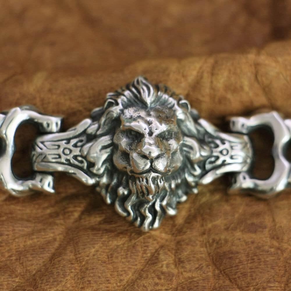 Esculpta © - Manjoolz. Solid silver male lion heads bracelet