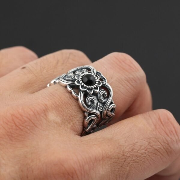 Silver And Onyx Ring on finger
