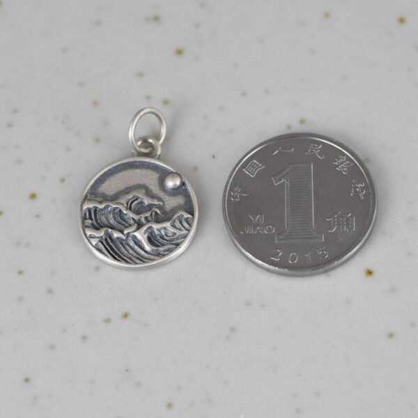 Silver Wave Pendant with a coin