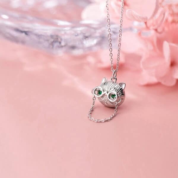 Sterling Silver Cat Face Pendant With Gemstone Eyes looks like owl