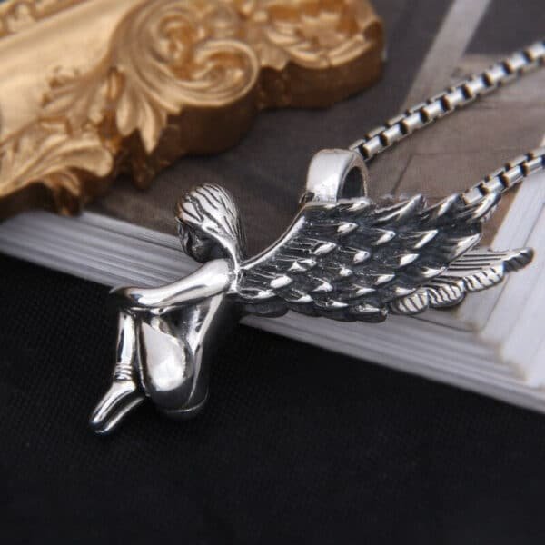 Silver Pendant 925 sitting angel side view