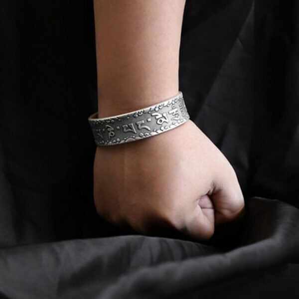 999 Silver Bracelet sanskrit on wrist