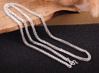 999 Silver Chain round shape face view