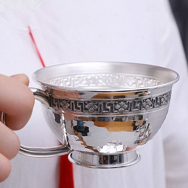 Silver Flatware saucer and tea cup cup holded