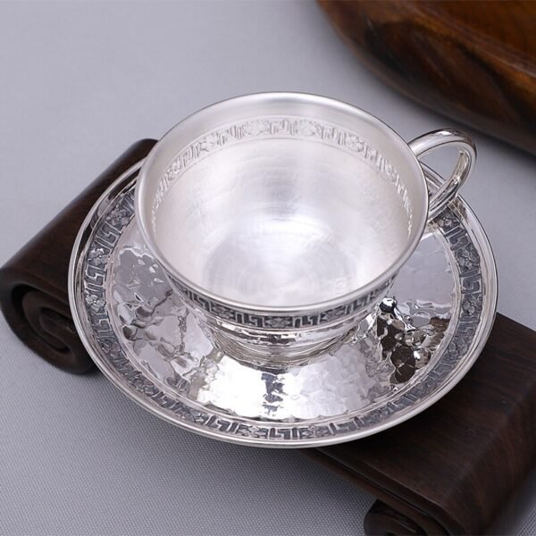 Silver Flatware saucer and tea cup up view