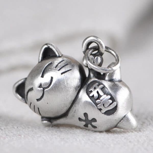 Silver Pendant 990 Japanese cat face view