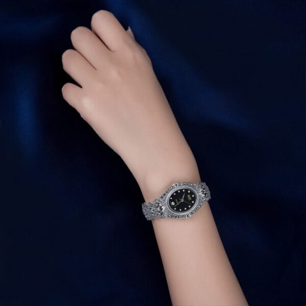 Silver Watch Women oval case black on wrist
