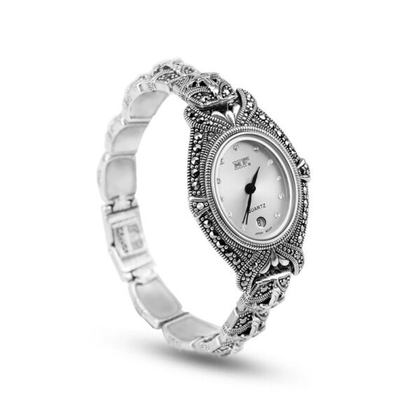 Silver oval dial watch white