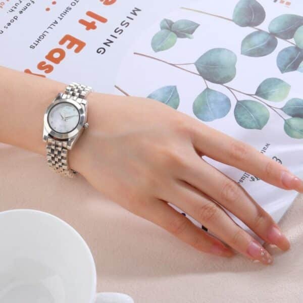 Silver Watch Women round screen on wrist